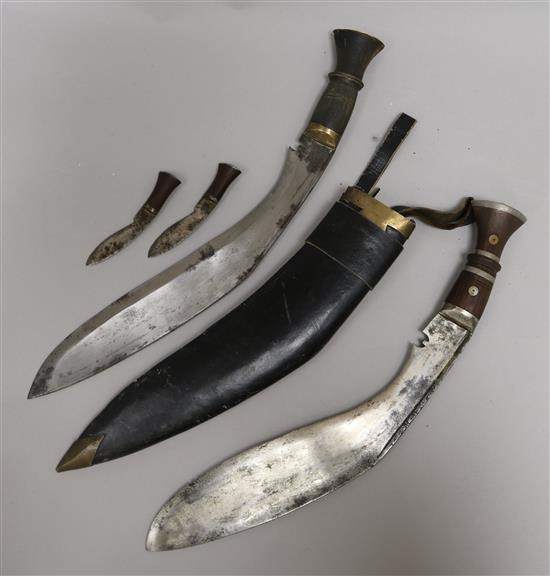 A military kukri and scabbard, and another without scabbard, 42cm